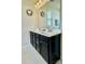 Bathroom with a double sink vanity, sleek cabinetry, and modern fixtures at 2769 Sawbridge Ln, Gastonia, NC 28056