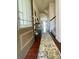 Inviting entryway with hardwood floors, a decorative rug, and access to a staircase at 2769 Sawbridge Ln, Gastonia, NC 28056