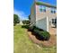 Exterior of house featuring a well-manicured lawn and a white privacy fence at 2769 Sawbridge Ln, Gastonia, NC 28056