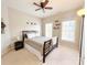 Comfortable bedroom with ceiling fan, neutral tones and natural light at 3114 Luke Crossing Dr, Charlotte, NC 28226
