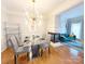 Inviting dining room featuring hardwood floors, modern decor, and an open layout at 3114 Luke Crossing Dr, Charlotte, NC 28226