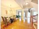 Open-concept space with a dining area seamlessly connecting to the living room and kitchen at 3114 Luke Crossing Dr, Charlotte, NC 28226