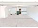 Spacious garage with storage cabinets and epoxy flooring at 3114 Luke Crossing Dr, Charlotte, NC 28226
