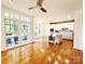 Open floor plan with eat-in kitchen featuring granite countertops, stainless steel appliances, and hardwood floors at 3114 Luke Crossing Dr, Charlotte, NC 28226