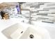Close-up of white kitchen sink with modern faucet and backsplash at 3114 Luke Crossing Dr, Charlotte, NC 28226