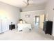 Bright and open main bedroom with a ceiling fan, dresser, and a bed with soft colored linens at 3114 Luke Crossing Dr, Charlotte, NC 28226