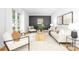 Bright living room with white walls, modern decor, and large windows for ample natural light at 4808 Cobble Glen Way, Charlotte, NC 28269