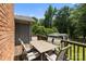 Spacious deck with dining table and chairs, perfect for outdoor entertaining at 5006 Crooked Oak Ln, Charlotte, NC 28226