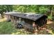 Wood sided home with a dark roof and steps leading up to the back entrances and wooded lot at 5212 Timber Creek Ct, Kings Mountain, NC 28086