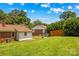 Spacious backyard featuring a well-maintained lawn and privacy fence at 564 Greenway Dr, Statesville, NC 28677