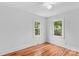 Bright bedroom featuring hardwood floors and natural lighting at 564 Greenway Dr, Statesville, NC 28677