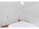 White bedroom with hardwood floors and two doors in view at 564 Greenway Dr, Statesville, NC 28677