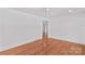 Cozy bedroom with hardwood floors and ample natural light from the windows at 564 Greenway Dr, Statesville, NC 28677