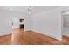 Spacious living room featuring hardwood floors, neutral walls, and a ceiling fan at 564 Greenway Dr, Statesville, NC 28677