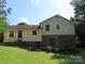 Exterior rear view showing the patio and backyard at 5823 Rupert Ln, Charlotte, NC 28215