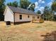 An expansive backyard featuring a newly-built wooden deck at 723 Taylor St, Rock Hill, SC 29730