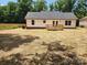 Large backyard featuring a wooden deck, providing a great space for relaxation at 723 Taylor St, Rock Hill, SC 29730