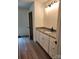 Bright bathroom features granite countertops, neutral walls, and white cabinets at 723 Taylor St, Rock Hill, SC 29730