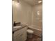 An updated bathroom featuring a granite vanity and a shower-tub combination at 723 Taylor St, Rock Hill, SC 29730
