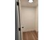 Bright, empty walk-in closet featuring sleek floors, neutral walls, and an access doorway at 723 Taylor St, Rock Hill, SC 29730