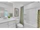 Bright bathroom features a shower-tub combo, modern vanity, and neutral decor at 9212 Delancey Ln # 63, Concord, NC 28027