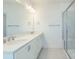 Bright bathroom featuring double vanity, ample counter space, and a glass-enclosed shower at 9212 Delancey Ln # 63, Concord, NC 28027