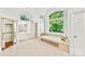 Large bathroom featuring a tub under bright window with a separate shower and double vanity at 929 Blacksnake Rd, Stanley, NC 28164