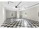 Garage with checkerboard floor at 929 Blacksnake Rd, Stanley, NC 28164