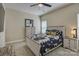 Comfortable bedroom with bright bedding, wood furniture, and carpeted floors at 9507 Pointer Rd, Huntersville, NC 28078