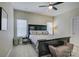 Inviting bedroom with dark furniture, comfortable bedding, and plenty of light at 9507 Pointer Rd, Huntersville, NC 28078