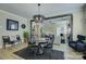 Open concept dining room, round table with pendant light at 9507 Pointer Rd, Huntersville, NC 28078