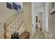 Hallway with staircase and half bathroom at 9507 Pointer Rd, Huntersville, NC 28078