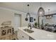 Kitchen island with stainless steel sink and faucet at 9507 Pointer Rd, Huntersville, NC 28078