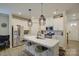 Modern kitchen featuring stainless steel appliances, an island with seating, and pendant lighting at 9507 Pointer Rd, Huntersville, NC 28078