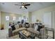 Comfortable living room features a large sectional sofa, television, and neutral paint at 9507 Pointer Rd, Huntersville, NC 28078