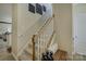 Carpeted stairway leads to the home's upper level at 9507 Pointer Rd, Huntersville, NC 28078