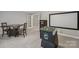 Another view of the spacious bonus room that has a projector screen and game table at 9735 Devonshire Dr, Huntersville, NC 28078