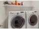 Convenient laundry room with a front load washer and dryer at 9735 Devonshire Dr, Huntersville, NC 28078
