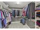Walk-in closet with ample shelving, racks, and storage space at 9735 Devonshire Dr, Huntersville, NC 28078