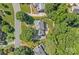 Stunning aerial view of home showcasing lush landscaping and private backyard at 10500 Kilmory Ter, Charlotte, NC 28210