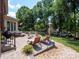 Backyard patio with outdoor seating, perfect for relaxation and entertainment at 10500 Kilmory Ter, Charlotte, NC 28210