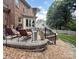 Serene backyard patio with comfortable seating and lush greenery, perfect for outdoor relaxation at 10500 Kilmory Ter, Charlotte, NC 28210