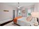 Cozy bedroom featuring a ceiling fan, natural light from windows, and a queen size bed at 10500 Kilmory Ter, Charlotte, NC 28210
