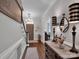 Elegant entryway with hardwood floors, staircase, and stylish lamps at 10500 Kilmory Ter, Charlotte, NC 28210