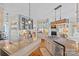 Bright kitchen with custom cabinets, granite countertops, and open design for seamless flow and entertaining at 10500 Kilmory Ter, Charlotte, NC 28210