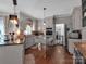 Charming kitchen equipped with modern appliances, custom cabinetry, and eat-in island at 10500 Kilmory Ter, Charlotte, NC 28210