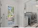 Clean laundry room with modern appliances and lots of natural light at 10500 Kilmory Ter, Charlotte, NC 28210
