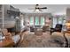 Cozy living room with fireplace, built-in shelves, and comfortable seating at 10500 Kilmory Ter, Charlotte, NC 28210