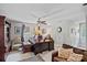Home office with wood furniture, a ceiling fan, and natural light at 10500 Kilmory Ter, Charlotte, NC 28210