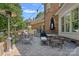 Outdoor patio seating with brick pavers and space to entertain at 10500 Kilmory Ter, Charlotte, NC 28210
